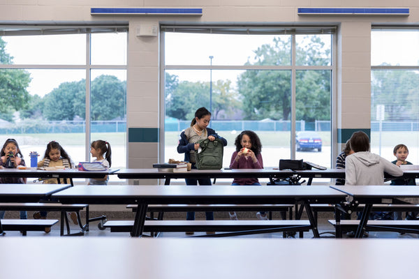 Photo of ACANTHUS Upper Room UVGI mounted in a school cafeteria