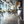 Load image into Gallery viewer, Conceptual application image of UV Can Sanitize's HEATHER UV-C disinfection Corn Light in a restaurant on a black stand with UV-C light on.