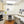 Load image into Gallery viewer, Image of Iris upper room wall-mounted UVGI fixture by UV Can Sanitize in a clinic