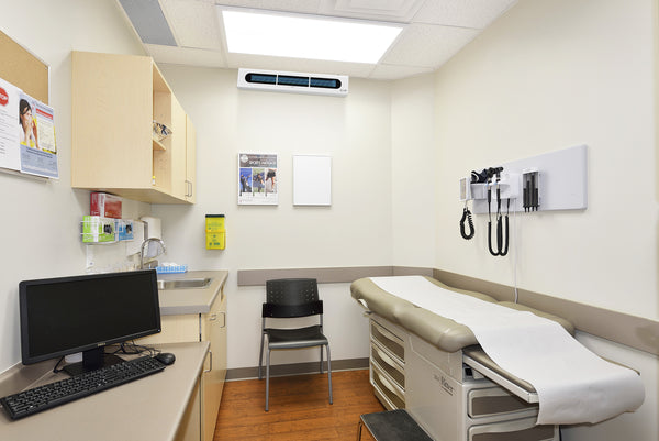 Image of Iris upper room wall-mounted UVGI fixture by UV Can Sanitize in a clinic