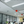 Load image into Gallery viewer, Photo of Carnation Upper Room UVGI Fixture from UV Can Sanitize installed in an office
